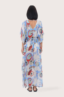 Back view of the light blue Zinnia kaftan with a relaxed flowing silhouette