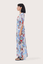 Side profile of the light blue Zinnia kaftan showcasing its elegant drape