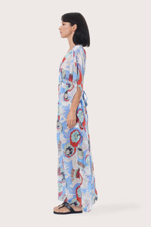 Side profile of the light blue Zinnia kaftan showcasing its elegant drape