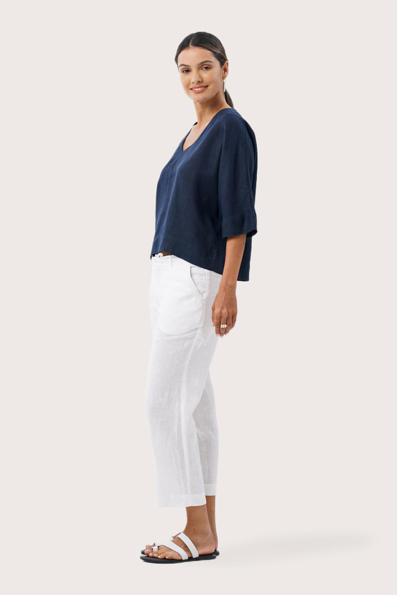 Side profile showing the flattering relaxed fit and breathable linen construction