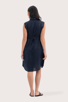 Back view of the Noelani Sleeveless Linen Dress Navy highlighting the garment shape and drape