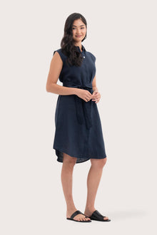 Side profile of the Noelani Sleeveless Linen Dress Navy showing its cut and natural movement