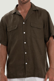 Close-up of the linen fabric texture and refined tailoring details on the army shirt
