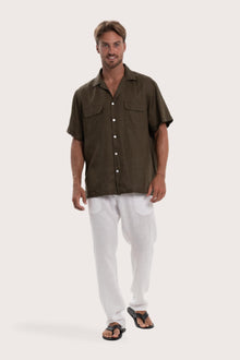 Model wearing the army linen Odyssey shirt by By The Sea Bali