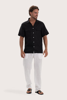 profile of the black linen shirt showcasing its effortless drape and comfortable fit