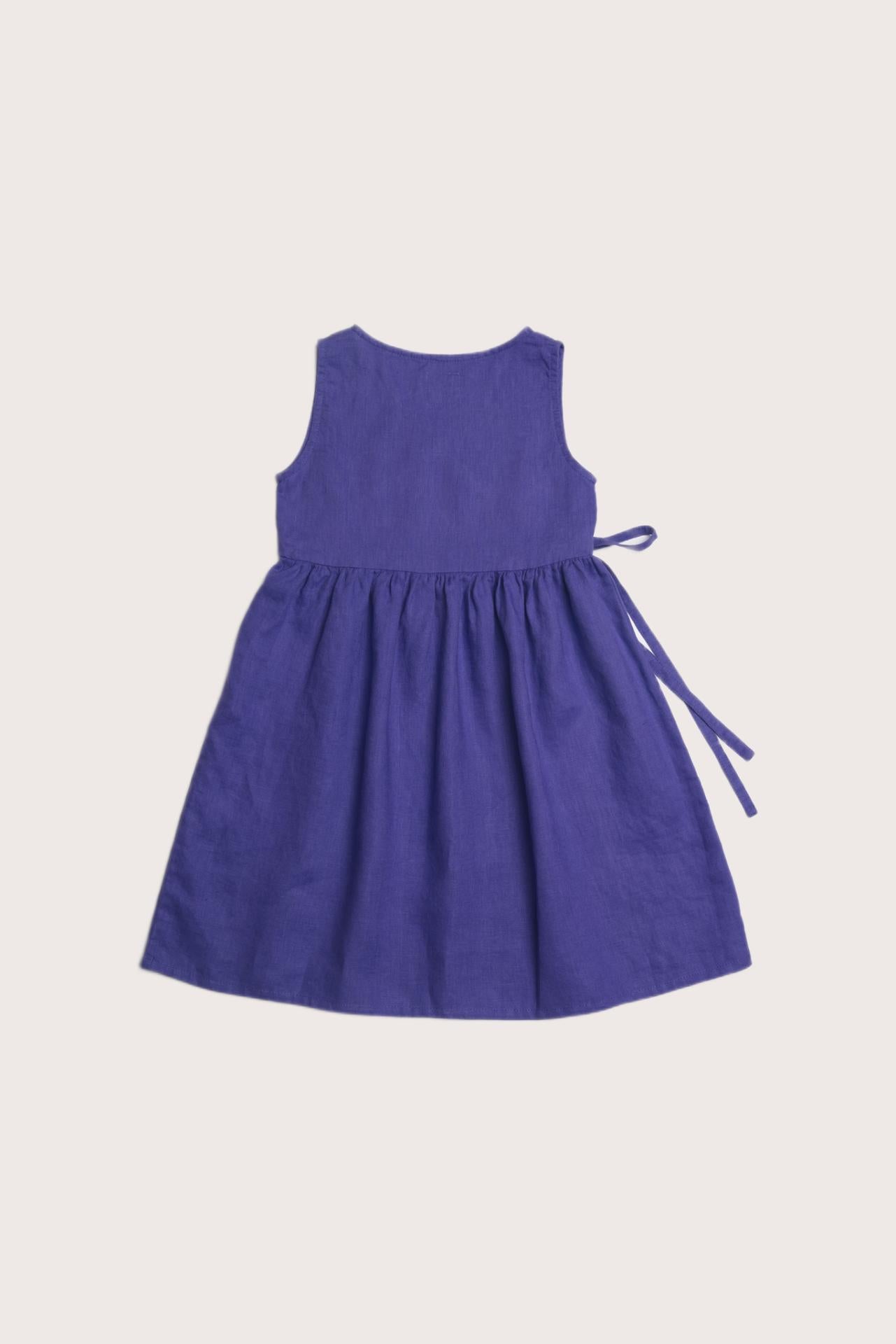Graceful back view of the Ortun Linen Kids Dress in Purple