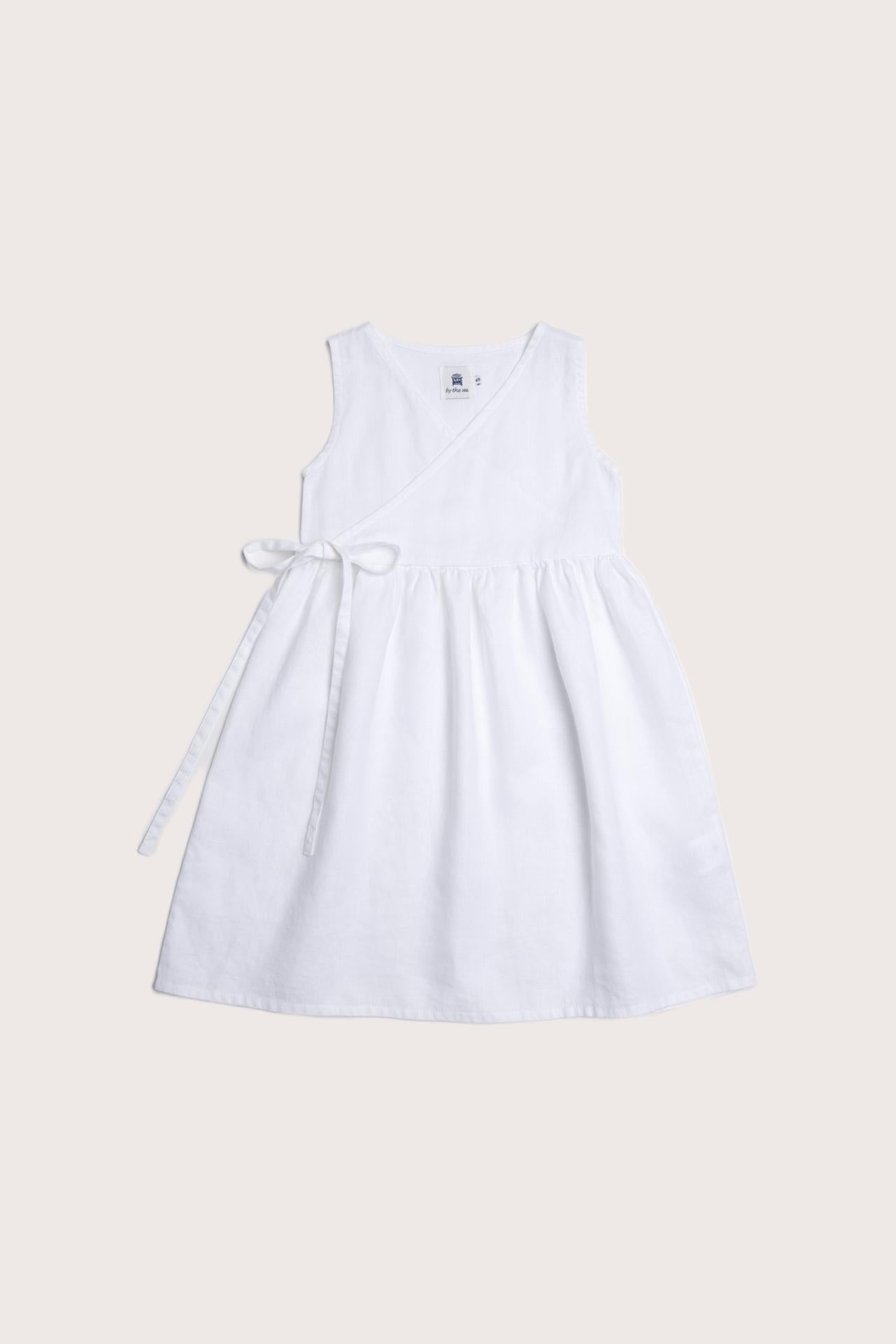 Ortun Linen Kids Dress in White designed for carefree island adventures