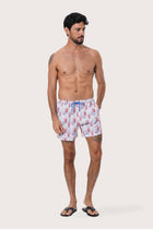 Close-up of the Coral print on the Light Blue Paco Swim Trunk by By The Sea Bali