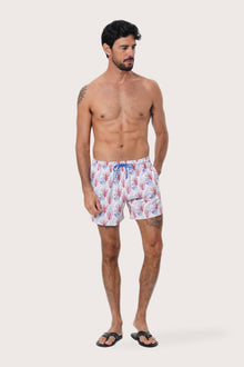 Close-up of the Coral print on the Light Blue Paco Swim Trunk by By The Sea Bali