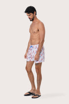 Side view of the Paco Swim Trunk in Coral Light Blue with elastic waistband detail by By The Sea Bali