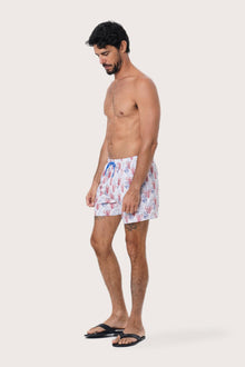 Side view of the Paco Swim Trunk in Coral Light Blue with elastic waistband detail by By The Sea Bali