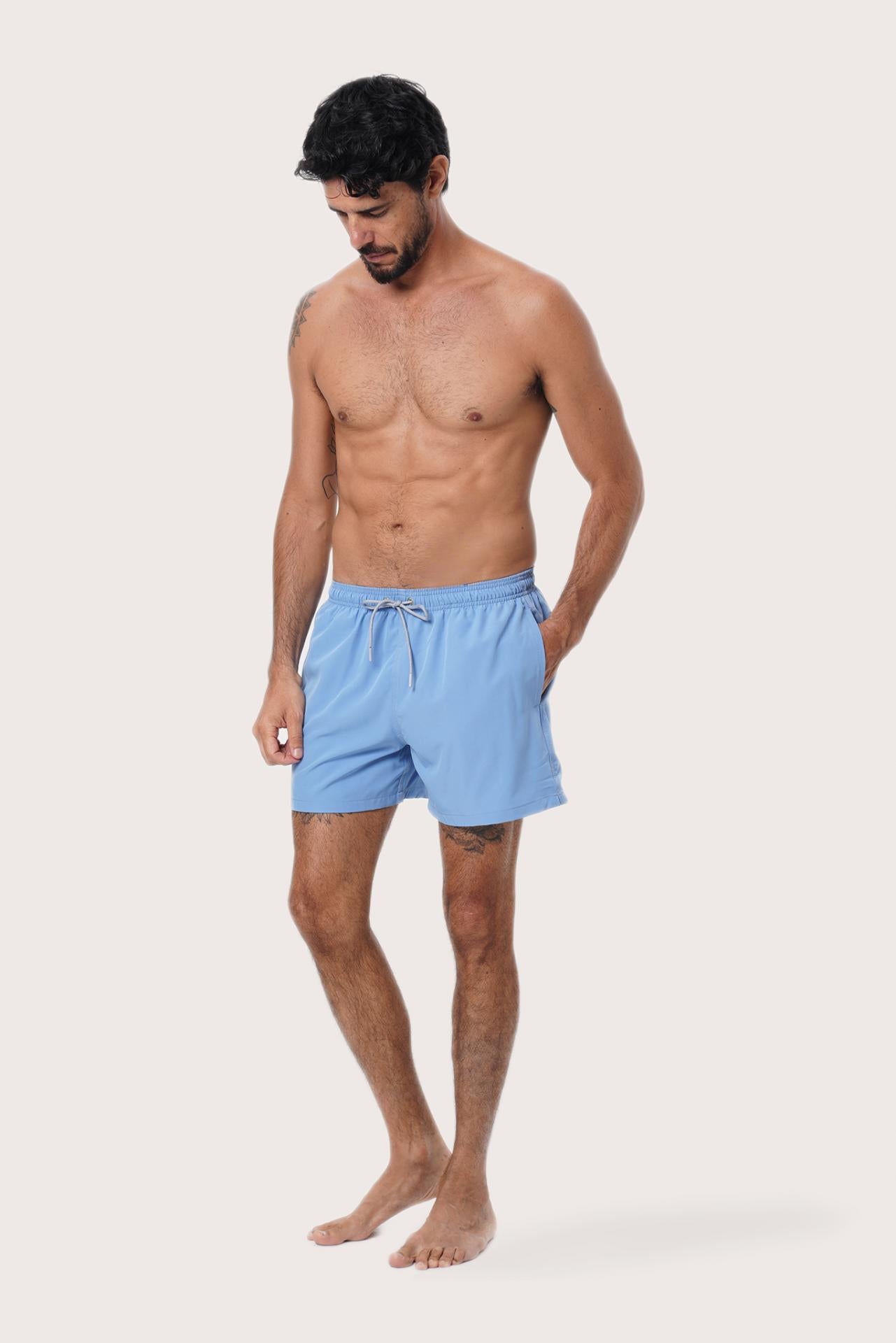 Side view of the Paco Swim Trunk in Light Blue with elastic waistband detail by By The Sea Bali