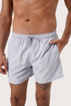 Side view of the Paco Swim Trunk in Light Grey with elastic waistband detail by By The Sea Bali