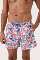 Side view of the Paco Swim Trunk in Lobster and Sea White with elastic waistband detail by By The Sea Bali
