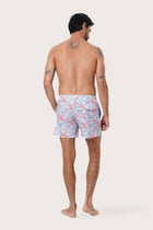 Close-up of the Pastel Coral print on the Light Blue Paco Swim Trunk by By The Sea Bali