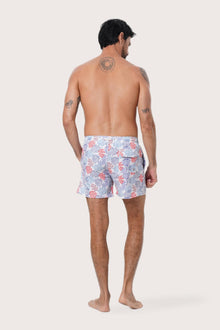 Close-up of the Pastel Coral print on the Light Blue Paco Swim Trunk by By The Sea Bali