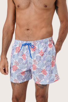 Side view of the Paco Swim Trunk in Pastel Coral Light Blue with elastic waistband detail by By The Sea Bali