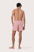 Fabric and stitching detail of the Pastel Pink Paco Swim Trunk by By The Sea Bali