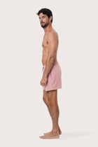 Front view of the Paco Swim Trunk in Pastel Pink by By The Sea Bali