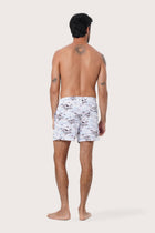 Close-up of the Ship and Island print on the Light Blue Paco Swim Trunk by By The Sea Bali