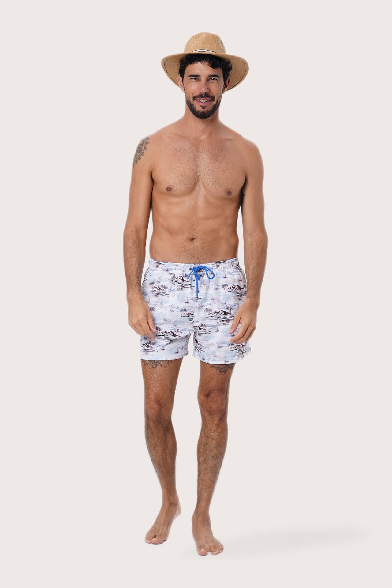 By The Sea Bali Paco Swim Trunk in Ship and Island Light Blue — quick-dry men's swim shorts in a nautical print