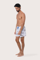 Front view of the Paco Swim Trunk in Ship and Island Light Blue print by By The Sea Bali