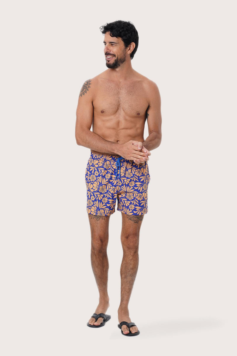Front view of the Paco Swim Trunk in Spring Flora Orange print by By The Sea Bali
