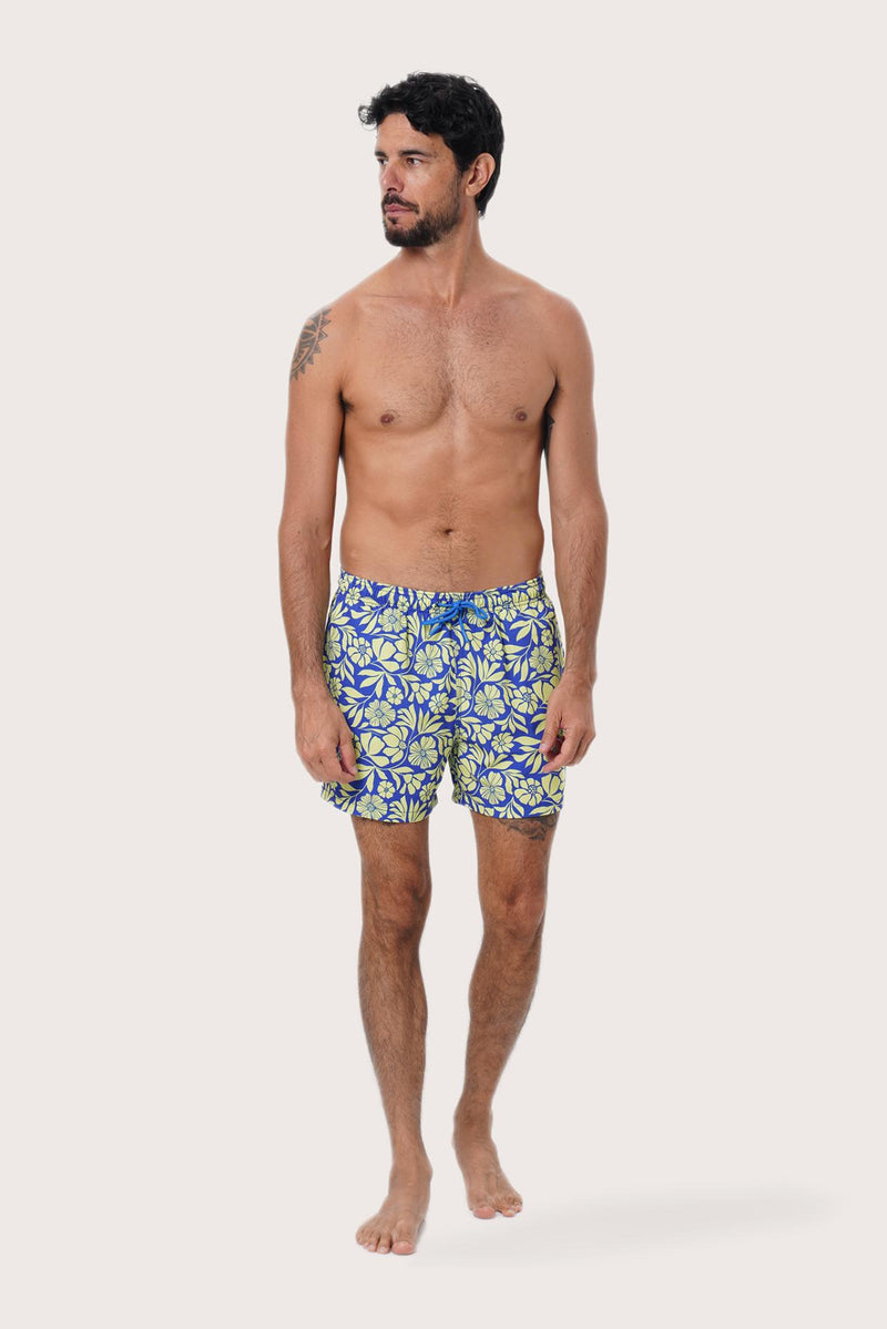 Front view of the Paco Swim Trunk in Spring Flora Yellow Lime print by By The Sea Bali