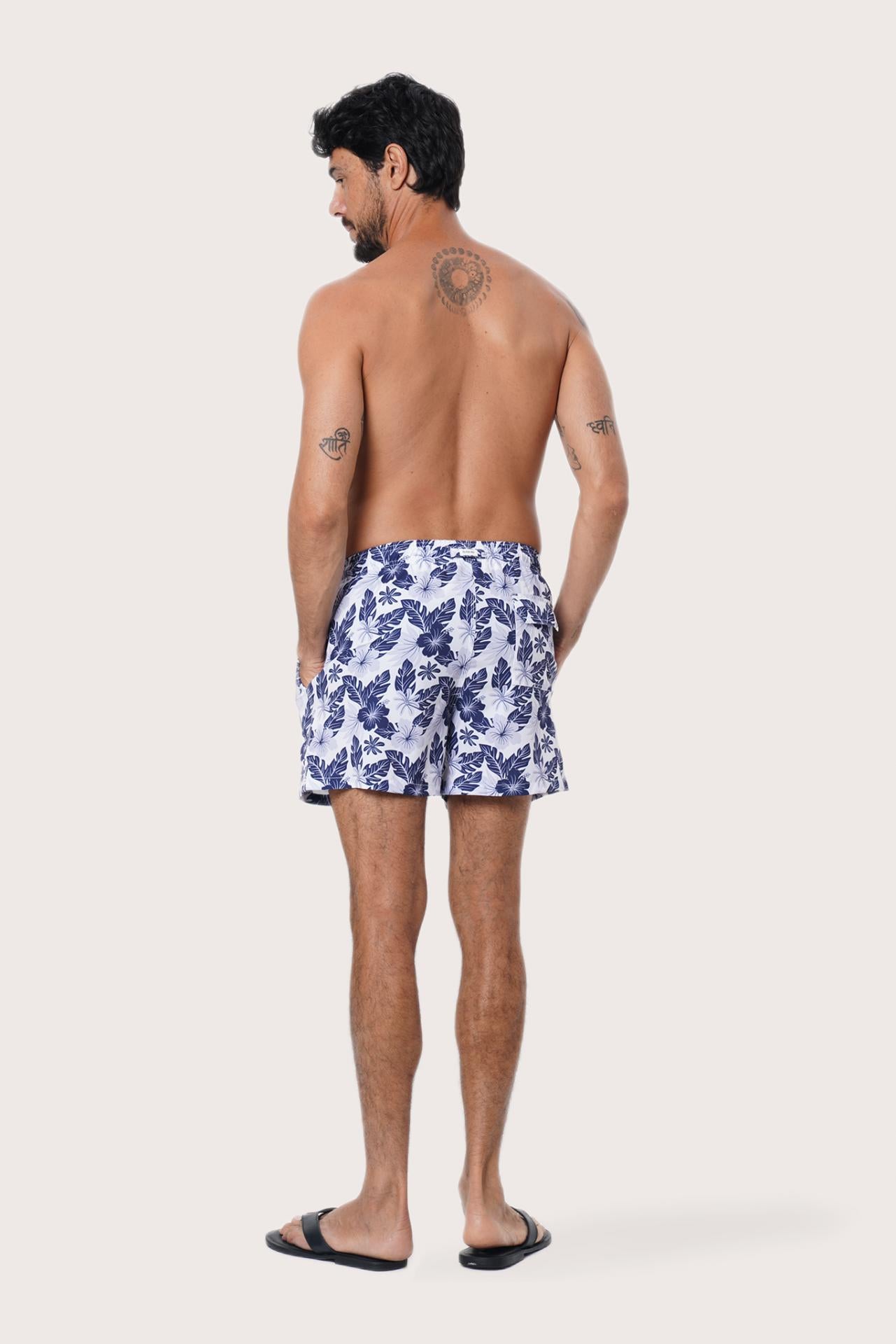 Close-up of the Summer Palm print on the Navy Paco Swim Trunk by By The Sea Bali