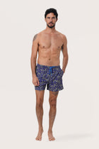 Side view of the Paco Swim Trunk in Tropic Garde Blue with elastic waistband detail by By The Sea Bali