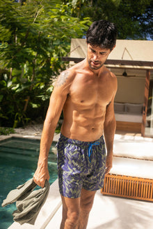 Close-up of the Tropic Garde print on the Blue Paco Swim Trunk by By The Sea Bali