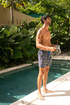 By The Sea Bali Paco Swim Trunk in Tropic Garde Blue — quick-dry men's swim shorts in a lush tropical print