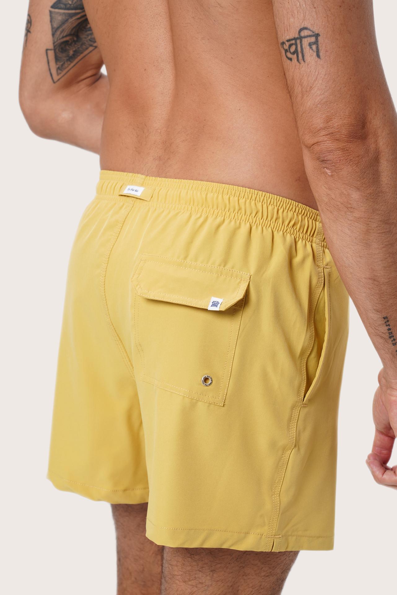 Back view of the Yellow Paco Swim Trunk showing the pocket detail by By The Sea Bali