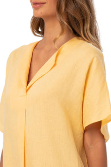 Close up detail of the Padar Linen Dress Lymun highlighting craftsmanship and design features