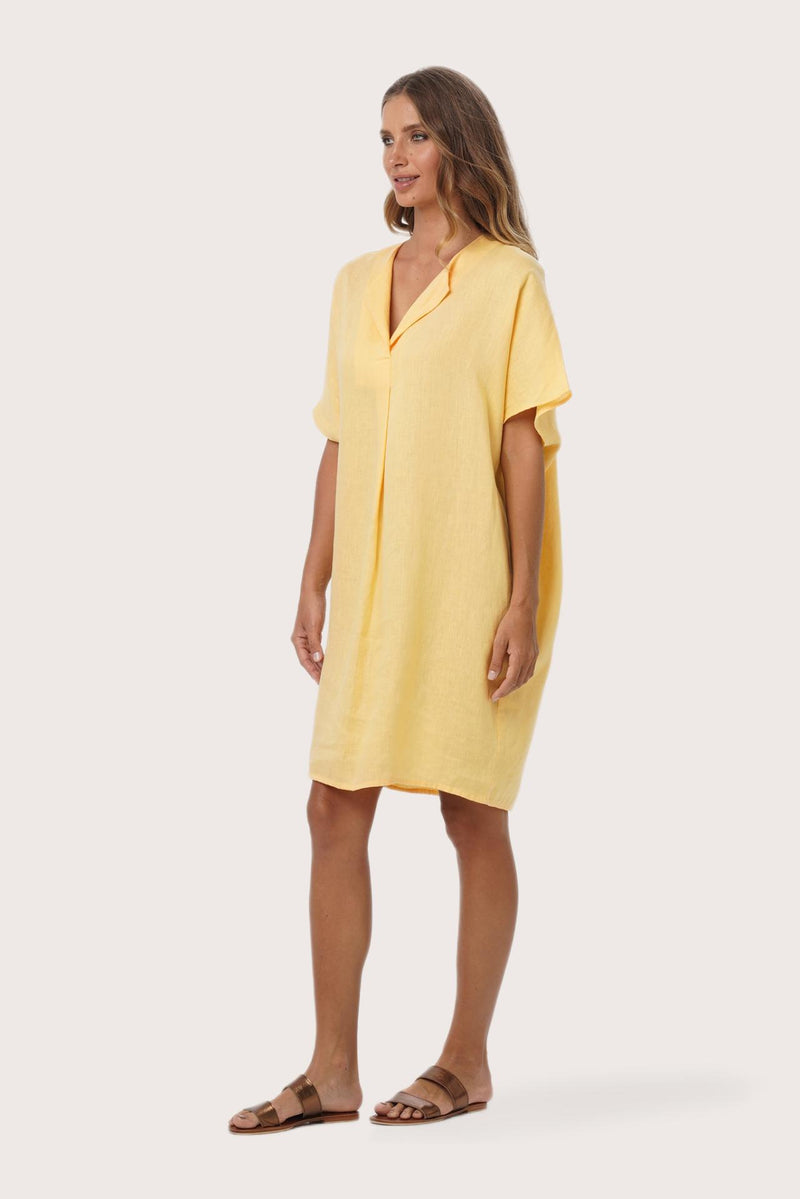 Side profile of the Padar Linen Dress Lymun showing its cut and natural movement