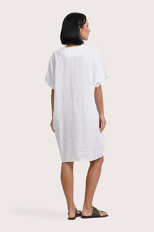 Back view of the Padar Linen Dress White highlighting the garment shape and drape