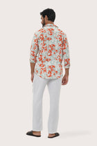 Close-up of the Bamboo Spring Red botanical print on the Panta Cotton Shirt by By The Sea Bali