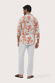Close-up of the Bamboo Spring Red botanical print on the Panta Cotton Shirt by By The Sea Bali