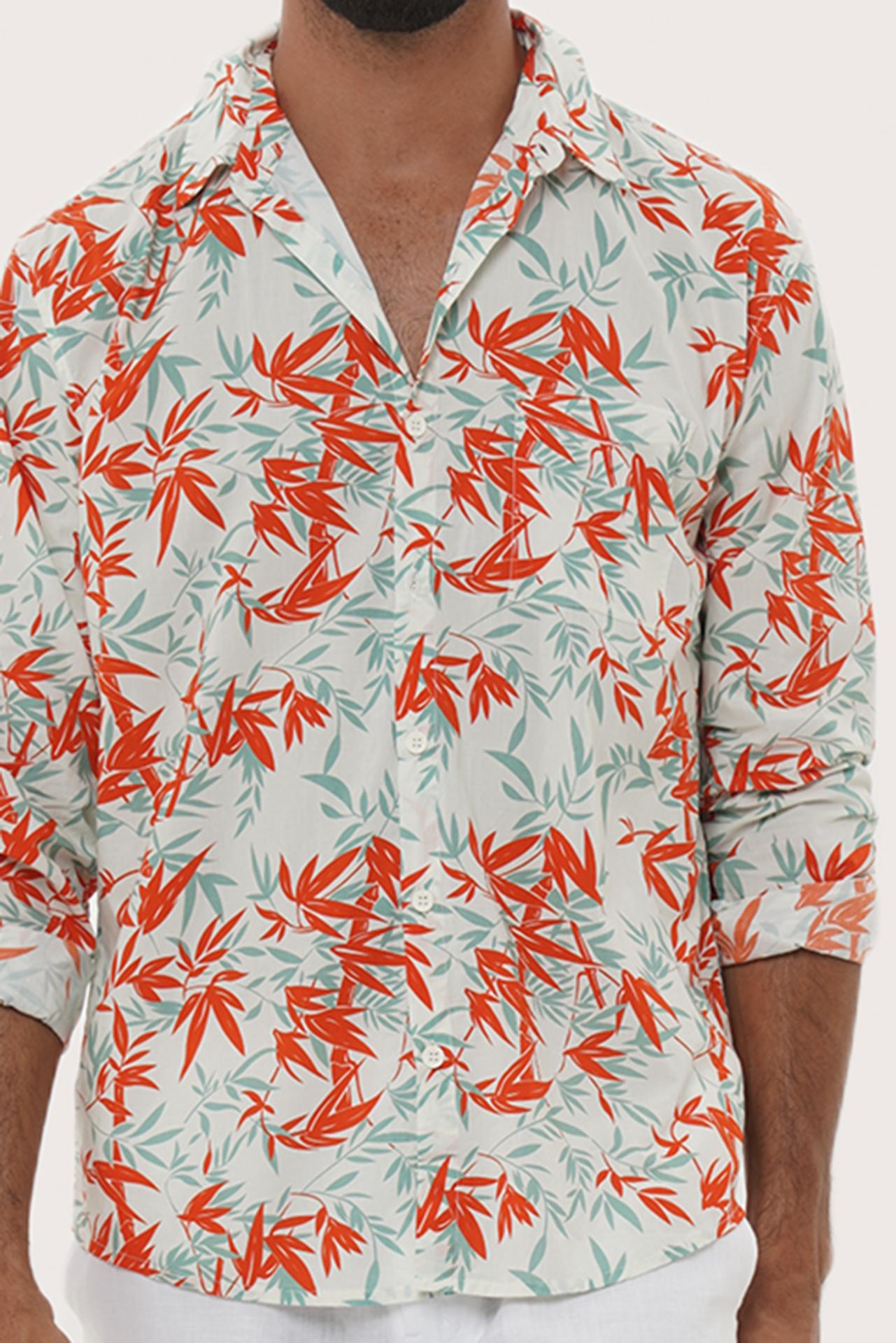 Side profile of the Panta Cotton Shirt in Bamboo Spring Red showing its relaxed fit by By The Sea Bali