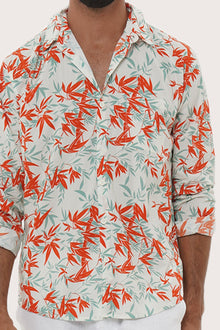 Side profile of the Panta Cotton Shirt in Bamboo Spring Red showing its relaxed fit by By The Sea Bali