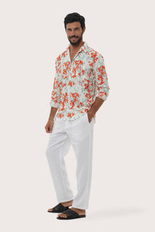 Front view of the Panta Cotton Shirt in Autumn Blue Bamboo Spring Red print by By The Sea Bali