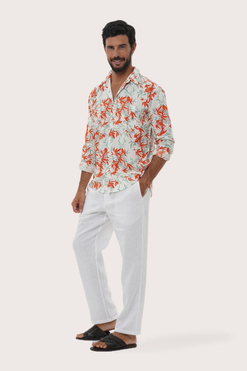 Front view of the Panta Cotton Shirt in Autumn Blue Bamboo Spring Red print by By The Sea Bali