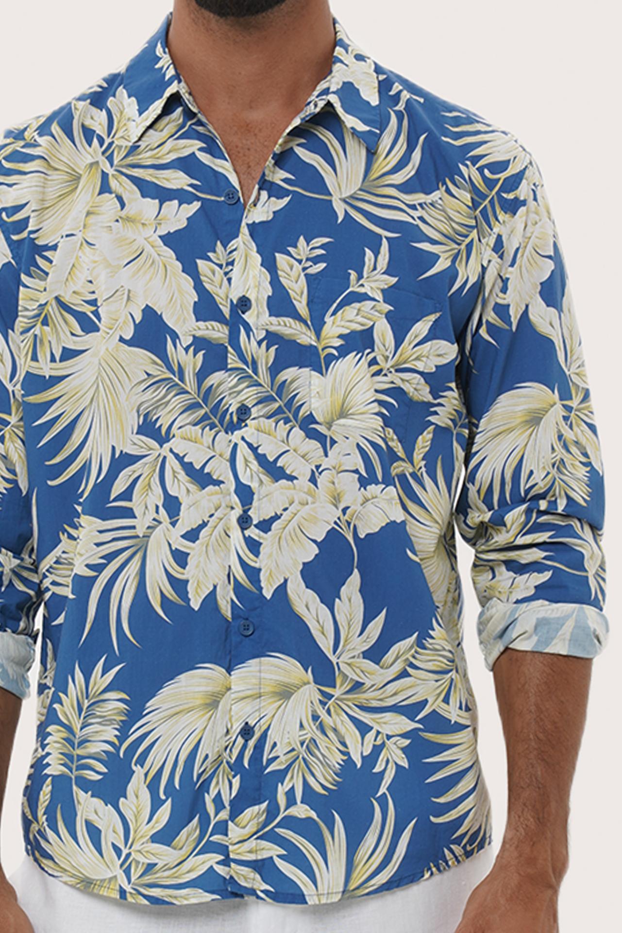 Side profile of the Panta Cotton Shirt in Hibiscan Batik Blue showing its relaxed fit by By The Sea Bali