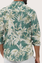 Men's resortwear styling featuring the Panta Cotton Shirt in Hibiscan Batik Green by By The Sea Bali