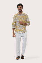 Front view of the Panta Cotton Shirt in Hibiscan Batik Yellow print by By The Sea Bali