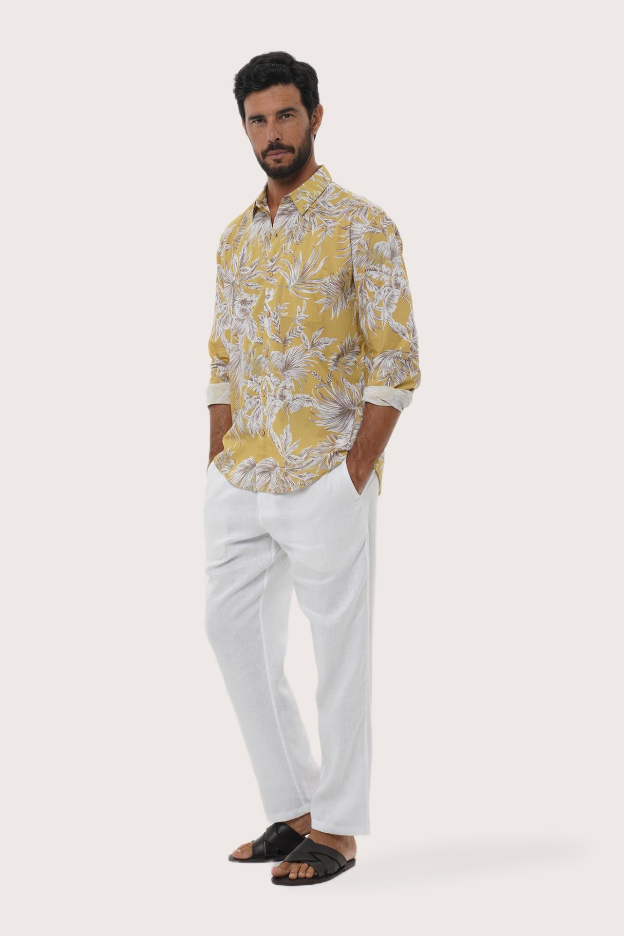 Close-up of the Hibiscan Batik Yellow print on the Panta Cotton Shirt by By The Sea Bali