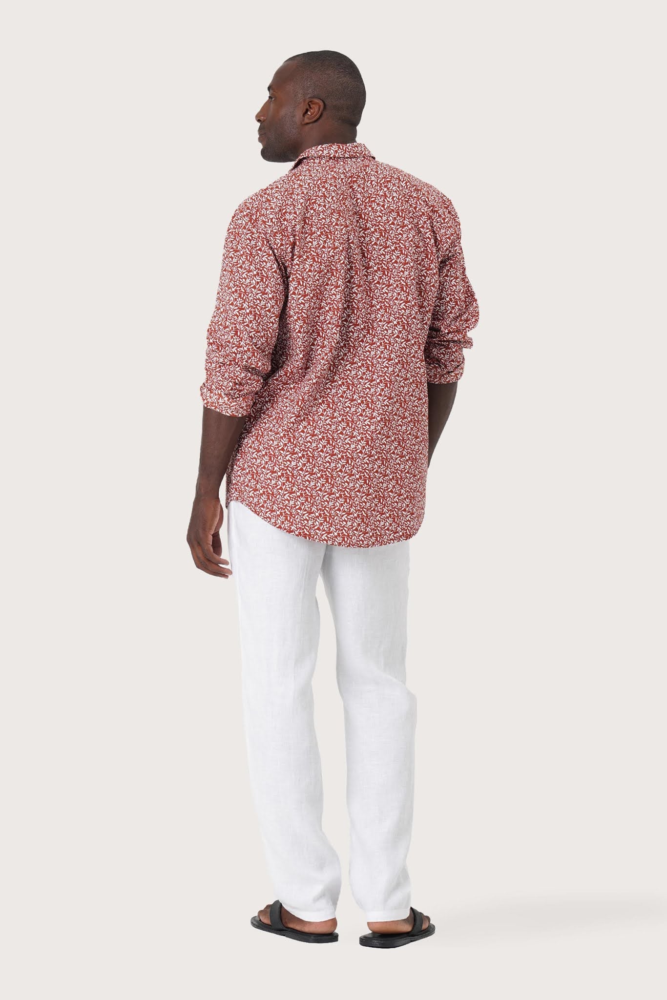 Back view of the Panta Cotton Shirt Summer Flora Spring Bliss Brick showcasing its tailored finish by By The Sea Bali