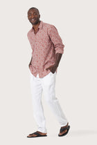 Side-angle view of the Panta Cotton Shirt Summer Flora Spring Bliss Brick showing its relaxed drape by By The Sea Bali