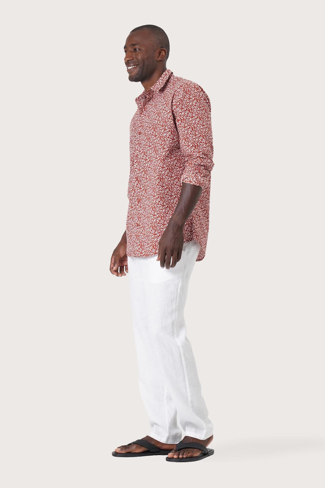 Side profile of the Panta Cotton Shirt Summer Flora Spring Bliss Brick highlighting its easy, breathable fit by By The Sea Bali