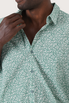 Close-up fabric and collar detail of the Panta Cotton Shirt Summer Flora Spring Bliss Green by By The Sea Bali